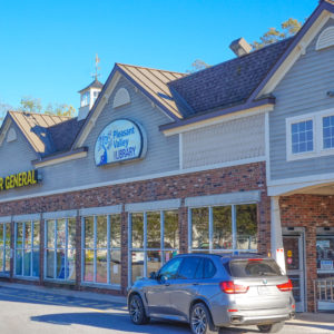 Image of the rear building of the Pleasant Valley Shopping Center